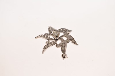 Lot 19 - Diamond flowerhead white metal brooch