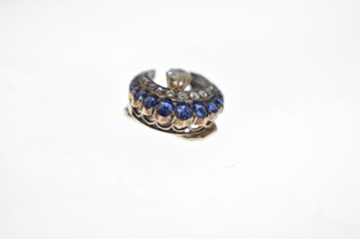 Lot 23 - Early 20th century diamond and sapphire crescent form scarf clip