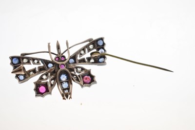 Lot Diamond, ruby and sapphire yellow and white metal set pendant brooch in the form of a butterfly