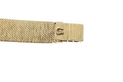 Lot Omega - Lady's 1960s 9ct gold bracelet watch