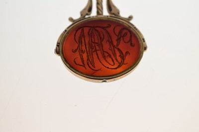 Lot Early 19th century carnelian intaglio unmarked yellow metal swivel fob