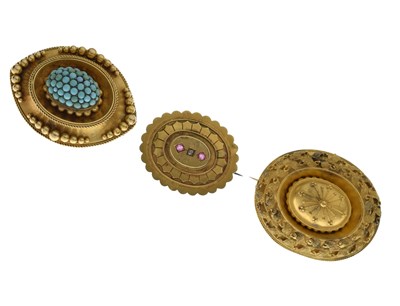 Lot 106 - Three Victorian gilt metal brooches