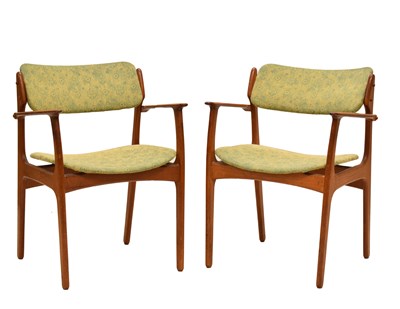 Lot 444 - Erik Buch for Odense Furniture, Denmark - Pair of 1960s teak armchairs