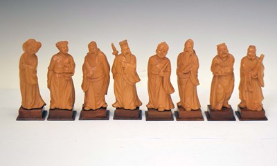Lot 582 - Set of Chinese 'Eight Immortals' in carved softwood