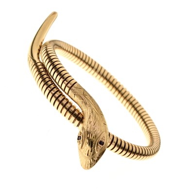 Lot 79 - 9ct gold coiled serpent bangle or bracelet