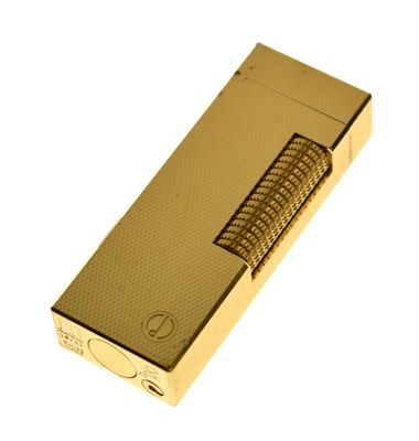Lot 363 - Late 20th century Dunhill gold plated cigarette lighter with engine-turned decoration