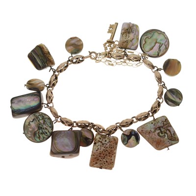 Lot 152 - Vintage yellow metal charm bracelet, stamped '375', attached abalone shell fragment charms