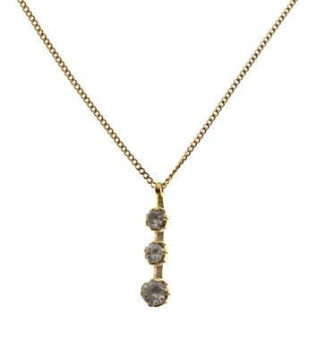 Lot 117 - Diamond three-stone pendant necklace