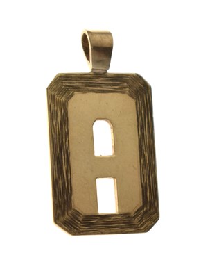 Lot 113 - Ingot pendant, cut out in the form of letter A