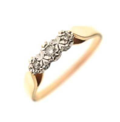 Lot 9 - Illusion set diamond three-stone 9ct gold ring