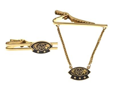 Lot 186 - 'Caltex' enamel decorated tie clips