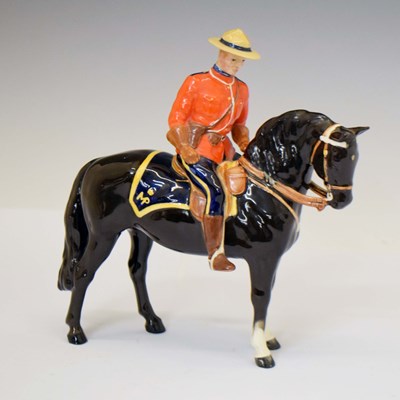 Lot 546 - Beswick - Model of a Canadian Mountie on black horse