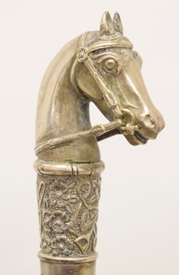 Lot 424 - White metal topped walking stick or cane