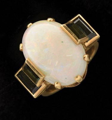 Lot 33 - Opal and green tourmaline 18ct yellow gold ring