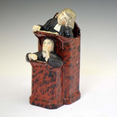 Lot 525 - Staffordshire pottery figure group, The Vicar and Moses