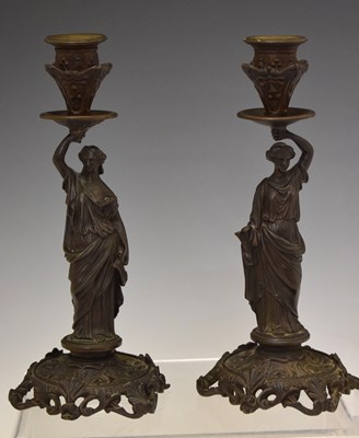 Lot 369 - Pair of late 19th century bronze figural candlesticks