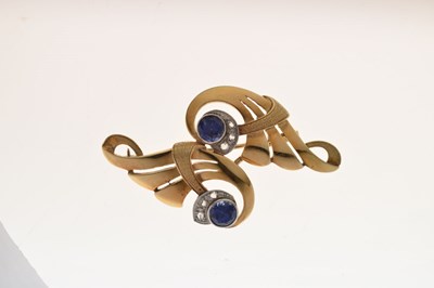Lot Sapphire and diamond scroll brooch