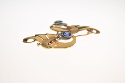 Lot Sapphire and diamond scroll brooch
