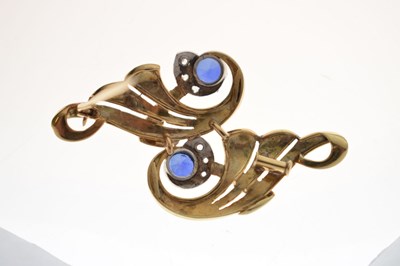 Lot Sapphire and diamond scroll brooch