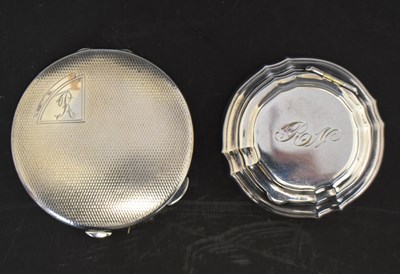 Lot 260 - George VI silver cased compact, together with a white metal circular pill box
