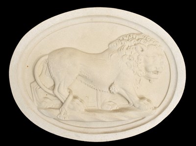 Lot 781 - Oval composition decorative wall plaque