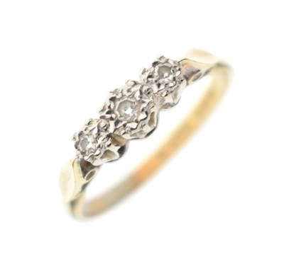 Lot 20 - Illusion set diamond three-stone 18ct gold ring