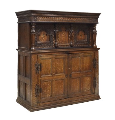 Lot 499 - 17th century and later inlaid oak press or court cupboard