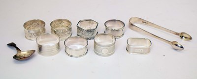 Lot 266 - Collection of eight silver and white metal napkin rings, etc