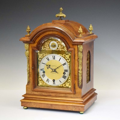 Lot 693 - Kemp Brothers, Bristol (Retailers) - German walnut chiming bracket clock