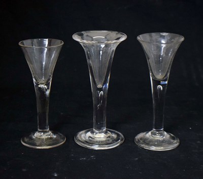 Lot 283 - Three mid 18th century wine glasses