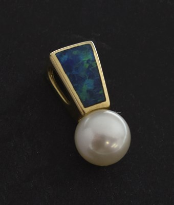 Lot 118 - Black opal and cultured pearl pendant, stamped '14K