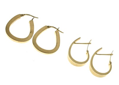 Lot 166 - Two pairs of 9ct gold elongated hoop earrings