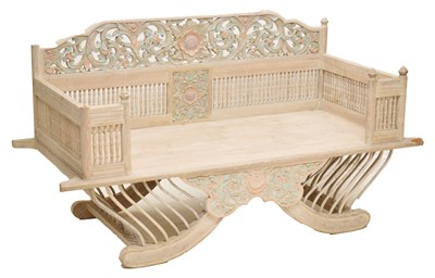 Lot 590 - Thai carved and painted teak settee