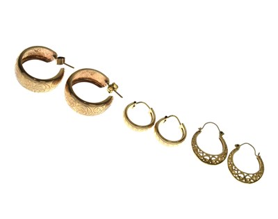 Lot 181 - Three pairs of 9ct gold hoop earrings