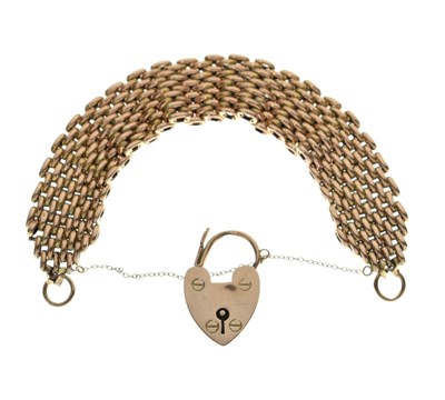 Lot 78 - Brick link bracelet having a large heart-shaped padlock clasp