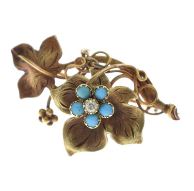 Lot 109 - Unmarked yellow metal brooch set turquoise