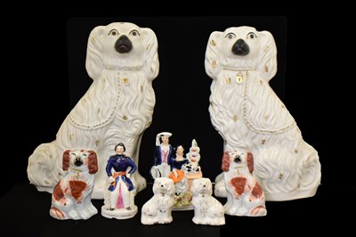 Lot 523 - Assorted Victorian and later Staffordshire pottery spaniels and figures