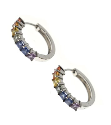 Lot 169 - Pair of rainbow gemstone 9ct white gold hoop earrings