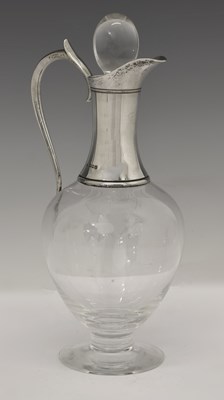 Lot 159 - Elizabeth II Dartington Crystal glass claret jug