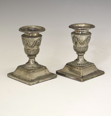 Lot 164 - Pair of late Victorian low candlesticks in the Adam Revival style