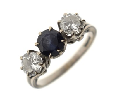 Lot 18 - Sapphire and diamond three stone 18ct white gold ring