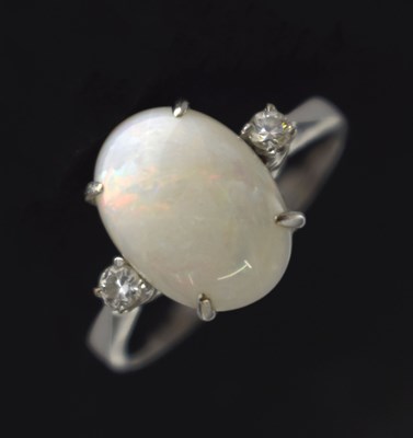 Lot 27 - Opal and diamond white metal dress ring