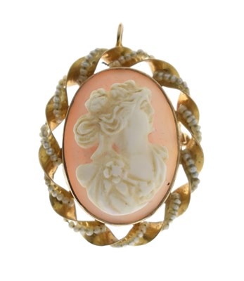 Lot 52 - Seed pearl yellow metal cameo pendant