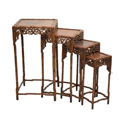 Lot 363 - Nest of four early 20th century Chinese carved hardwood occasional tables