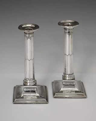 Lot Pair of George III silver column candlesticks