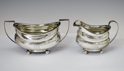 Lot Late George III (Regency) silver milk jug and two-handled sugar basin
