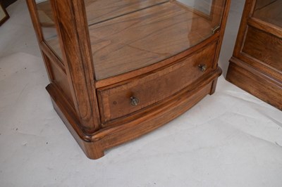 Lot 519 - Pair of Frank Hudson for John Lewis 'Hemingway' display cabinets of bowfront form